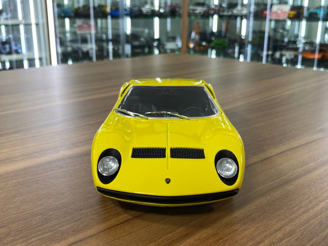 AutoArt Lamborghini Miura SV Yellow 1:18 Diecast Model Car - studio product photo of the scale model
