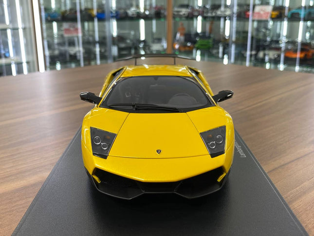 AutoArt Lamborghini Murcielago LP670-4 SV Giallo Orion Yellow 1:18 Diecast Model Car - studio product photo of the scale mode