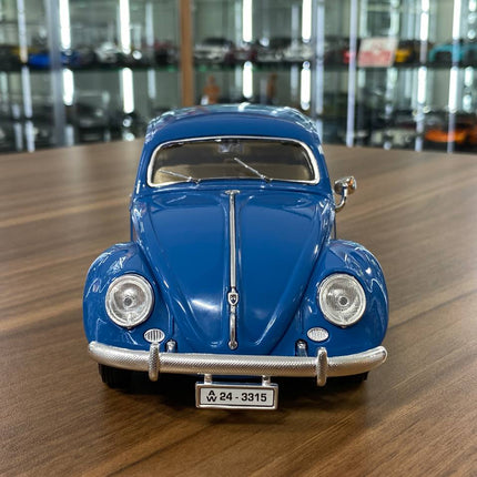 Bburago Volkswagen Kafer Beetle 1955 1/18 Diecast Model Car Blue - studio product photo of the scale model