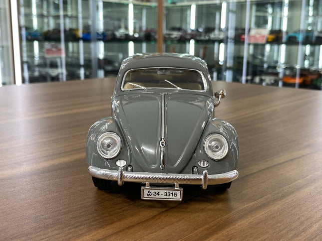 Bburago 1/18 Volkswagen Kafer Beetle (1955) Grey Diecast Model Car - studio product photo of the scale model