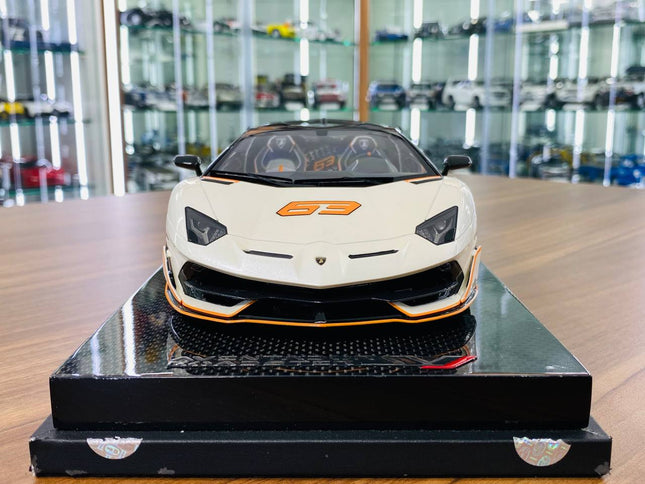 MR Collection 1/18 Lamborghini Aventador Roadster SVJ #63 Resin Model White/Orange - studio product photo of the scale model