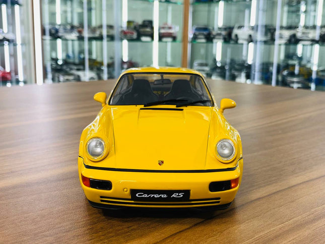 Solido Porsche 911 3.8 RS 1:18 Diecast Model Car Yellow - studio product photo of the scale model