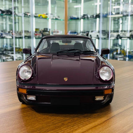 Minichamps 1/12 Porsche 911 Turbo 1977 Brown Diecast Model Car - studio product photo of the scale model