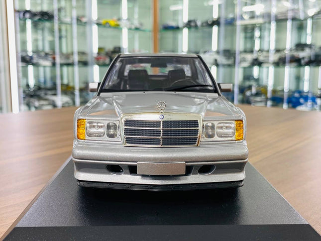 Minichamps Mercedes-Benz 190E 2.5-16 EVO II 1990 1:18 Diecast Model Car Silver - studio product photo of the scale model