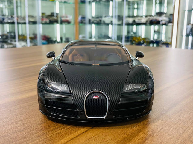 AutoArt Bugatti Veyron 16.4 Super Sport Black Carbon 1:18 Diecast Model Car - studio product photo of the scale model
