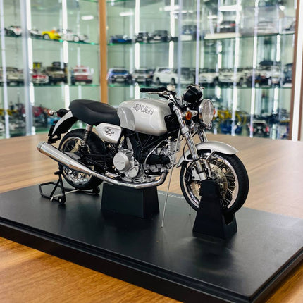 AutoArt Ducati GT 1000 Silver 1:18 Diecast Model Motorcycle - studio product photo of the scale model