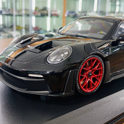 Minichamps Porsche 911 992 GT3 RS 2023 1:18 Black with Red Wheels Diecast Model - detailed die-cast style model