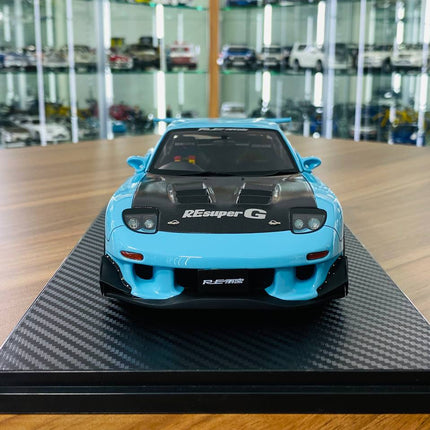Ignition Model Mazda RX-7 RE Super G (FD3S) 1/18 Resin Model Light Blue Limited Edition - studio product photo of the scale m