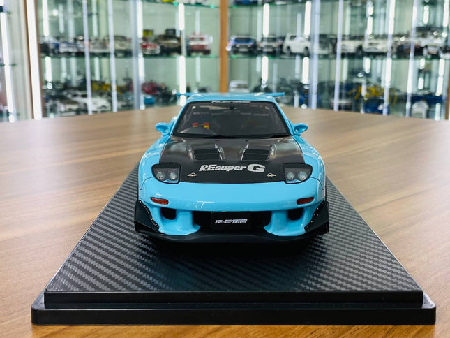 Ignition Model Mazda RX-7 RE Super G (FD3S) 1/18 Resin Model Light Blue Limited Edition - studio product photo of the scale m