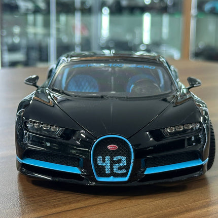 Bburago Chiron Zero 400 Zero 1:18 Diecast Car Black Blue - studio product photo of the scale model