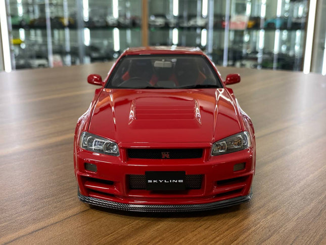 MotorHelix Nissan Skyline GT-R R34 Customized Version 1/18 Diecast Active Red - studio product photo of the scale model