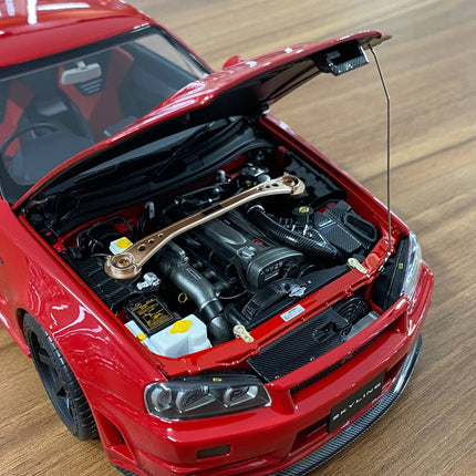 MotorHelix Nissan Skyline GT-R R34 Customized Version 1/18 Diecast Active Red - scale model for display