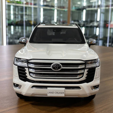 LCD Model Toyota Land Cruiser LC300 ZX White Full Opening 1:18 Diecast Model Car - studio product photo of the scale model