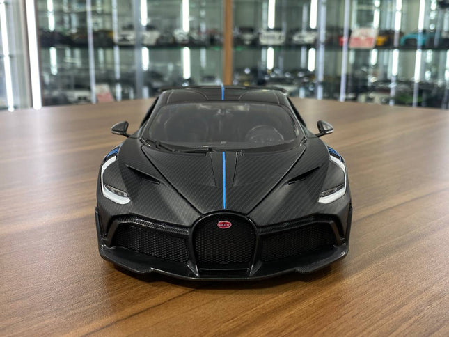 Bburago 1/18 Bugatti Divo Matt Carbon Fiber Diecast Model Car - studio product photo of the scale model