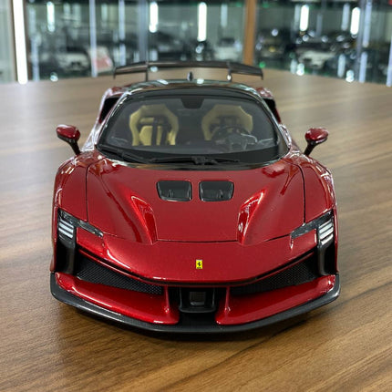 Bburago Ferrari SF90 XX Stradale 1/18 Dark Red Diecast Model Car - studio product photo of the scale model