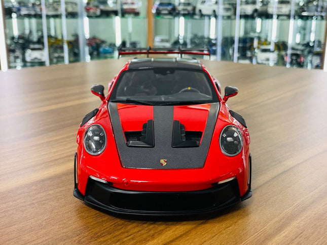 Minichamps Porsche 911 (992) GT3 RS Weissach Package 2022 1/18 Diecast Model Red - studio product photo of the scale model
