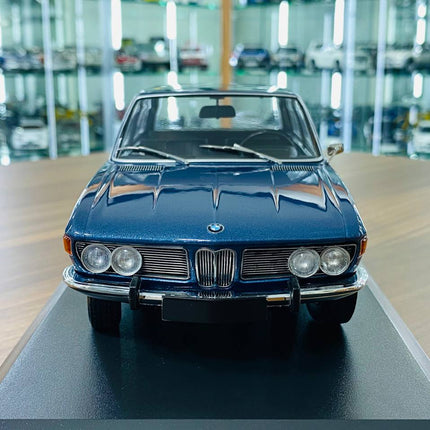 Minichamps BMW 2500 (1968) 1/18 Blue Metallic Diecast Model - studio product photo of the scale model