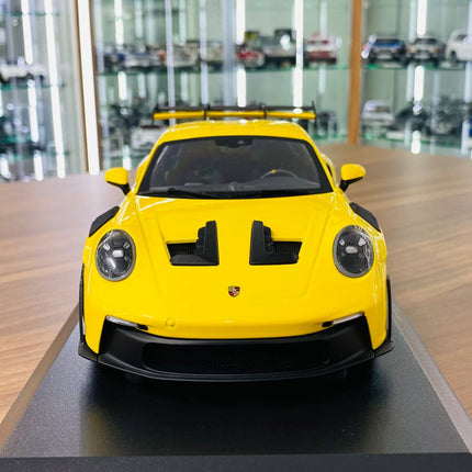 Minichamps 1/18 Porsche 911 (992) GT3 RS 2023 Diecast Model Yellow Black Wheels Limited 300 Pcs - studio product photo of the