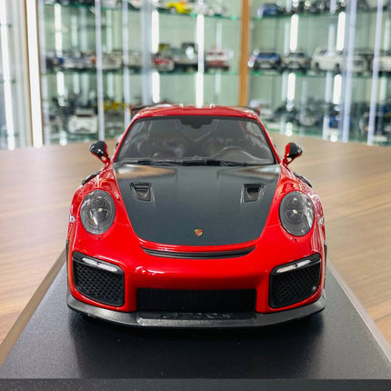 Minichamps 1/18 Porsche 911 (991.2) GT2 RS 2018 Red Diecast Model - studio product photo of the scale model