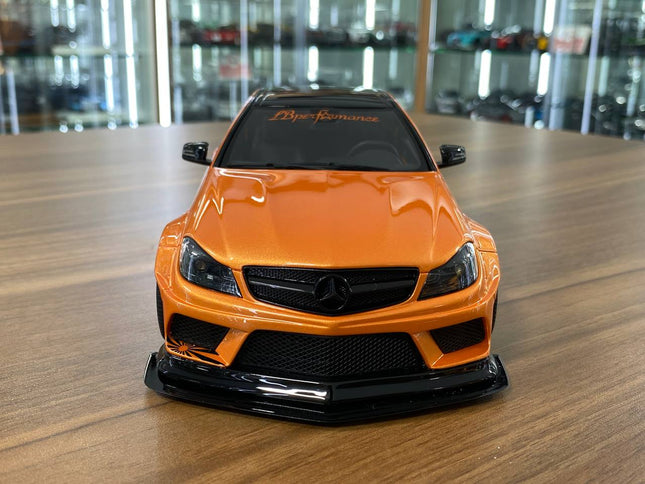 GT Spirit 1:18 Mercedes-Benz AMG C63 Coupe W204 LB Works Resin Model Orange - studio product photo of the scale model