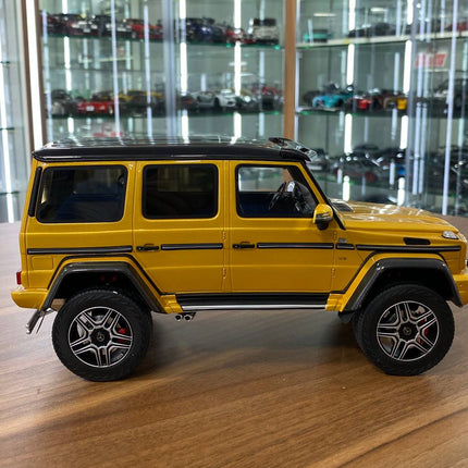 GT Spirit Mercedes Benz G500 4x4 Gold 1/18 Black/Yellow Resin Model - studio product photo of the scale model