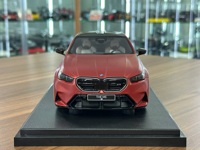 GT Spirit 1:18 BMW M5 G90 2025 Saloon Matt Red Resin Model - studio product photo of the scale model