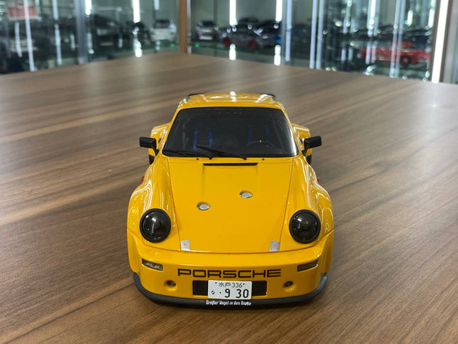 GT Spirit 1:18 Porsche 911 Carrera RSR Homage 1974 Diecast Model Car Yellow - studio product photo of the scale model