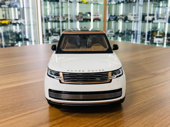 LCD Model Land Rover Range Rover 2022 - White with Gold Roof 1:18 Diecast Model Car - studio product photo of the scale model