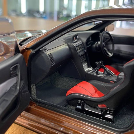 MotorHelix 1/18 Nissan Skyline GT-R R34 Customized Diecast Model Metallic Bronze - showroom-quality model replica