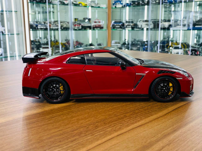 AutoArt Nissan GT-R R35 Nismo Package Red Carbon 1:18 Diecast Model Car - studio product photo of the scale model