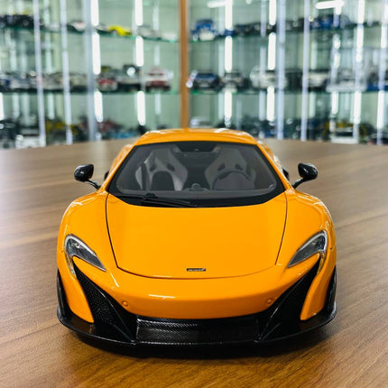 AutoArt McLaren 675LT Orange 1:18 Diecast Model Car - studio product photo of the scale model