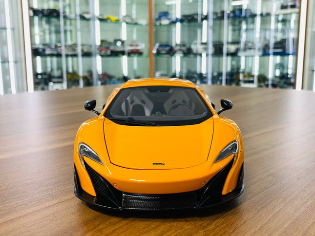 AutoArt McLaren 675LT Orange 1:18 Diecast Model Car - studio product photo of the scale model