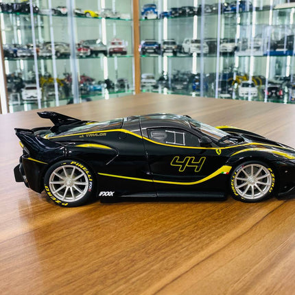 Bburago Signature Series Ferrari FXX K #44 1/18 Diecast Model Car Black/Yellow - collectible scale model car