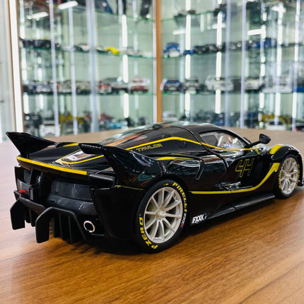 Bburago Signature Series Ferrari FXX K #44 1/18 Diecast Model Car Black/Yellow - scale model for display
