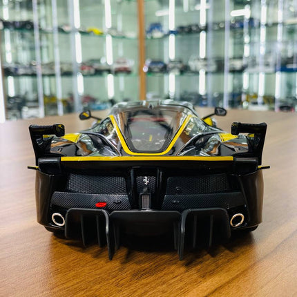 Bburago Signature Series Ferrari FXX K #44 1/18 Diecast Model Car Black/Yellow - detailed die-cast style model
