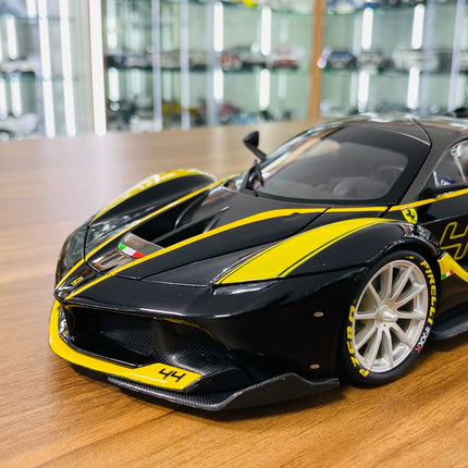 Bburago Signature Series Ferrari FXX K #44 1/18 Diecast Model Car Black/Yellow - premium collector scale model