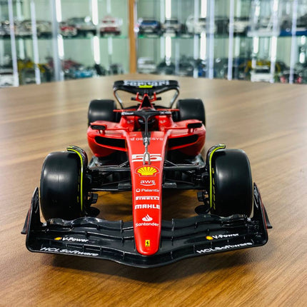 1/18 Metal Diecast Bburago Ferrari SF-23 C. Sainz #55 Matt Red - studio product photo of the scale model