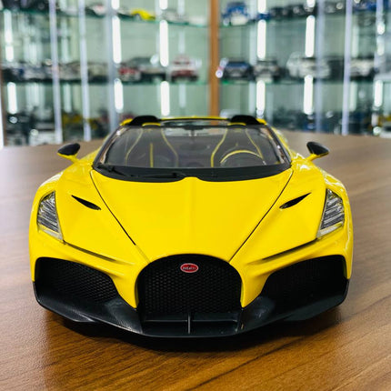 Bburago Bugatti Mistral 1:18 Yellow Diecast Model Car - studio product photo of the scale model