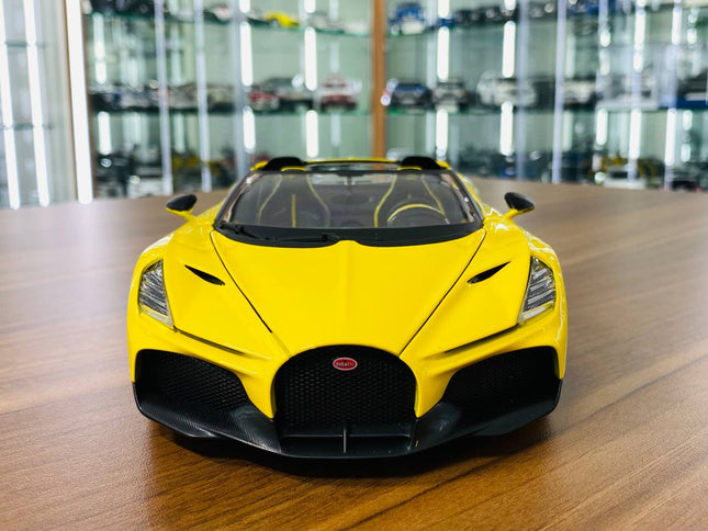 Bburago Bugatti Mistral 1:18 Yellow Diecast Model Car - studio product photo of the scale model