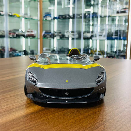 Bburago 1/18 Ferrari Monza SP1 Silver Metallic with Yellow Stripes Diecast Model Car - studio product photo of the scale mode