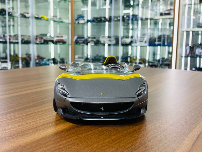 Bburago 1/18 Ferrari Monza SP1 Silver Metallic with Yellow Stripes Diecast Model Car - studio product photo of the scale mode