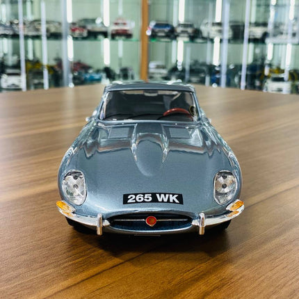 Bburago Jaguar E Type Coupe 1/18 Diecast Model Car Blue - studio product photo of the scale model