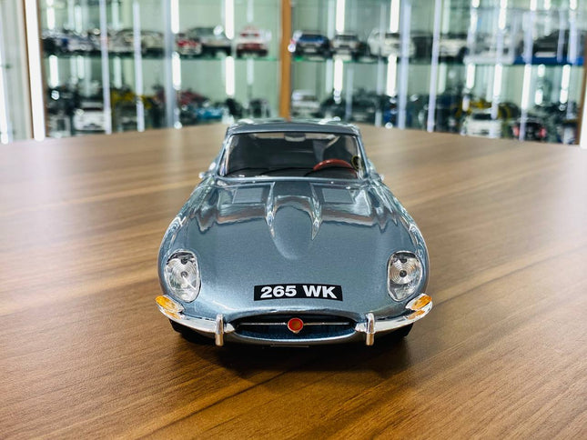 Bburago Jaguar E Type Coupe 1/18 Diecast Model Car Blue - studio product photo of the scale model