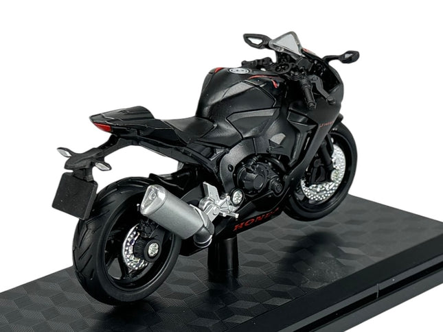 1:18 scale black Honda sport motorcycle diecast model on a display stand