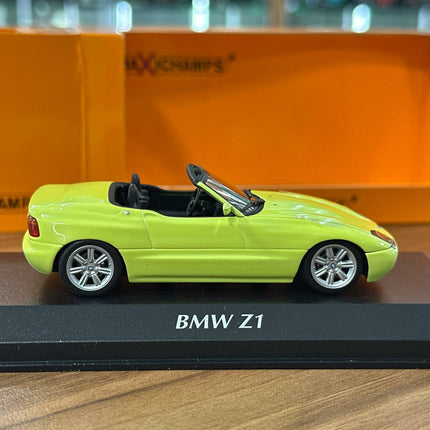 Maxichamps BMW Z1 (E30) 1991 1:43 Yellow Diecast Model Car - studio product photo of the scale model