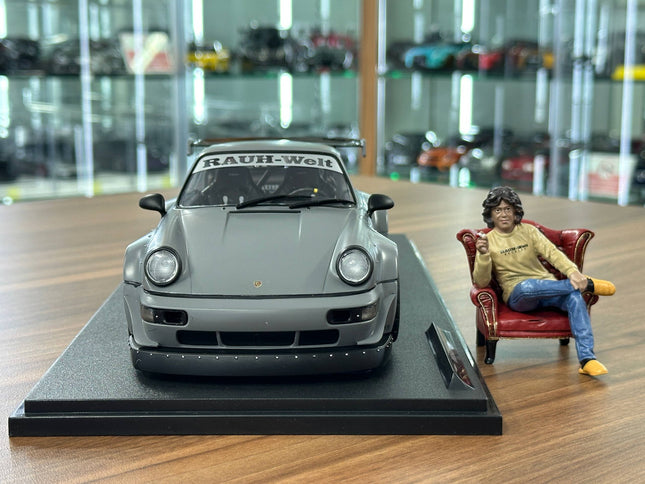 Solido Porsche RWB 2024 1:18 Nardo Grey Diecast Model Car Figure Included - studio product photo of the scale model