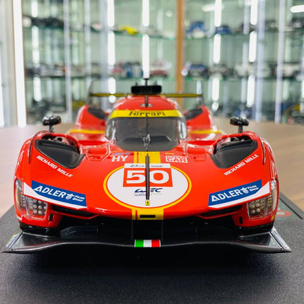Bburago Ferrari 499P #50 24h Le Mans 1:18 Diecast Model Car Red Yellow - studio product photo of the scale model