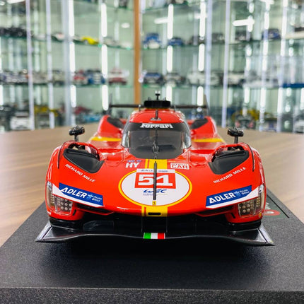Bburago Ferrari 499P #51 24h Le Mans 1/18 Diecast Model Car Red/Yellow - studio product photo of the scale model