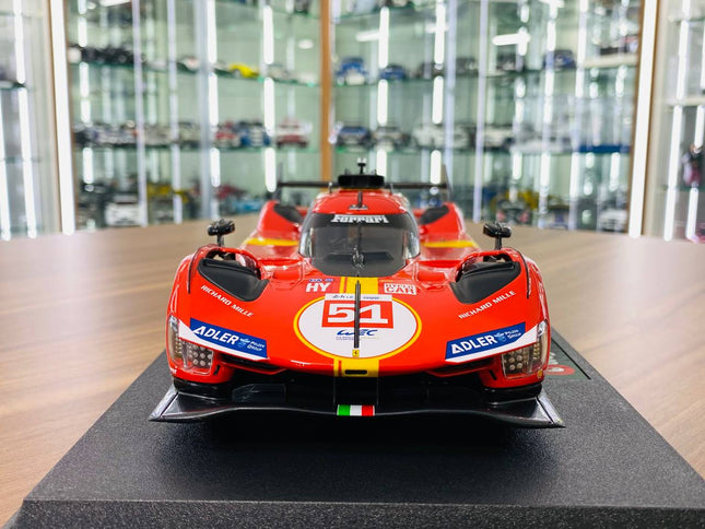 Bburago Ferrari 499P #51 24h Le Mans 1/18 Diecast Model Car Red/Yellow - studio product photo of the scale model
