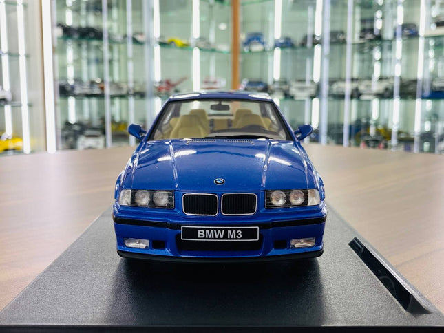 1/18 Diecast Solido BMW M3 E36 Coupe 1990 Blue (Doors Opening) - studio product photo of the scale model